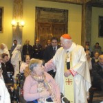 1 Il Cardinale A. Scola alloscambio della pace con gli anziani ospiti